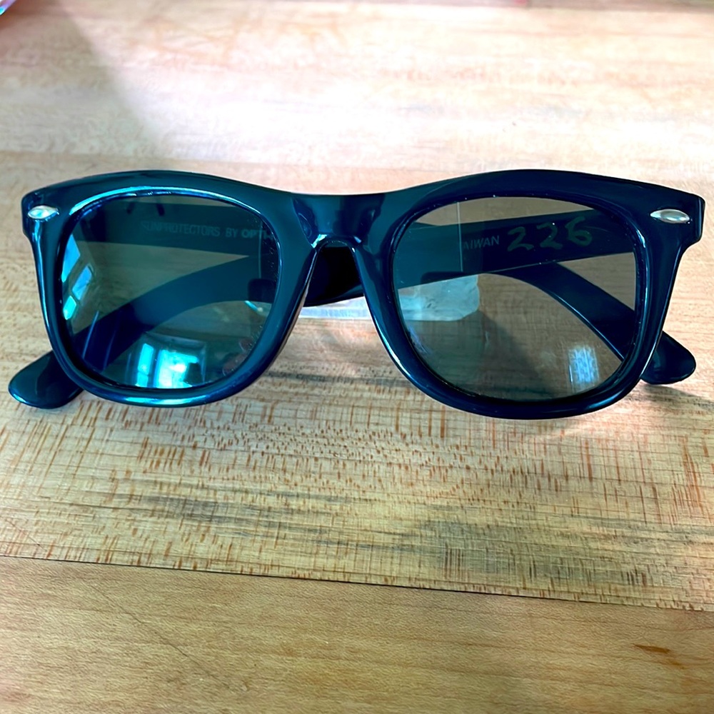 Sun protectors “ by Opti-ray.